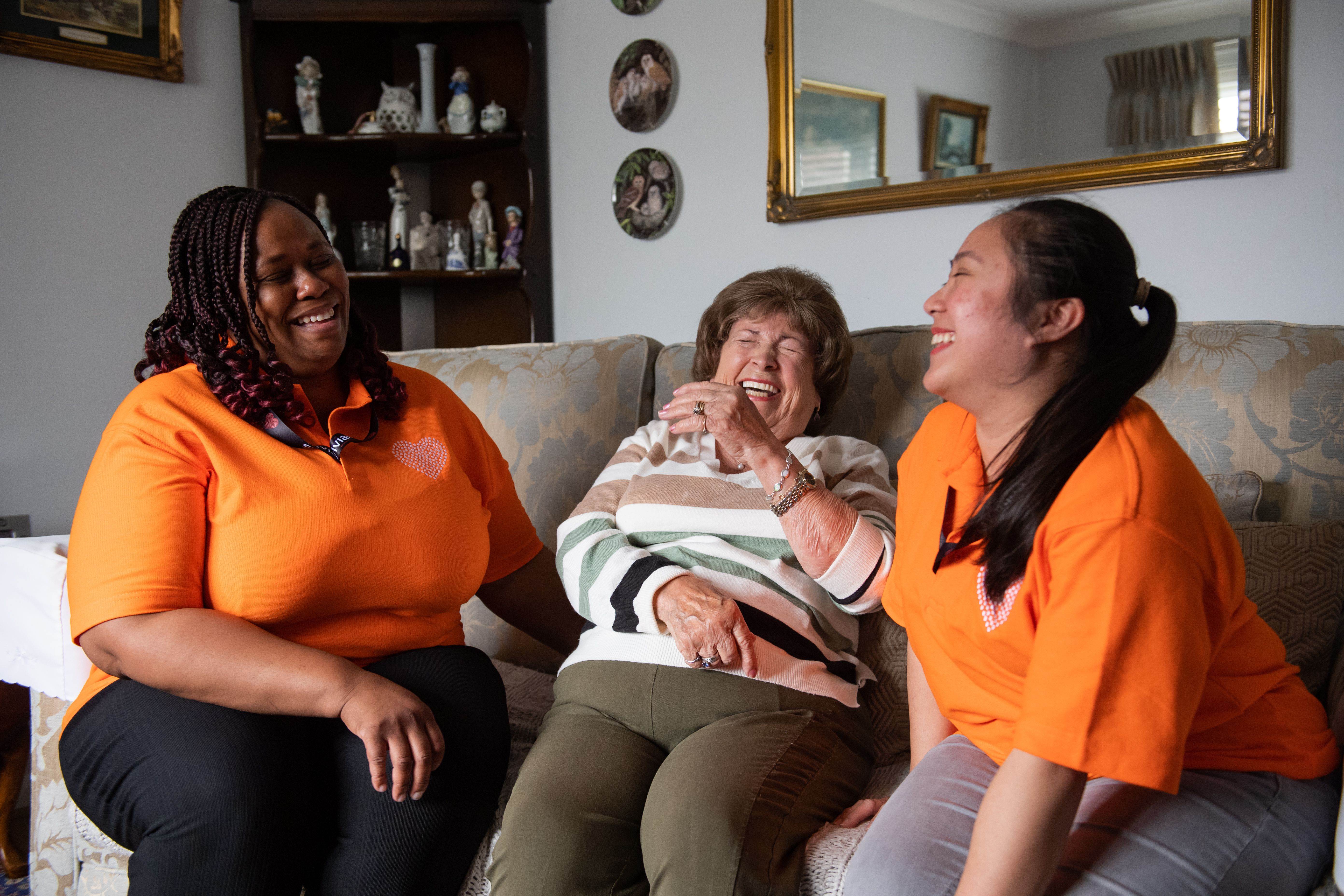 Sylvian Care workers with patient