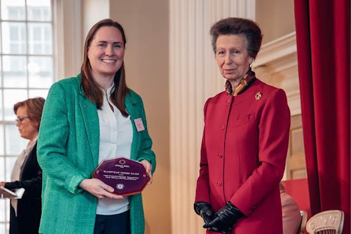 Dr Hannah MacKechnie receives Princess Royal Training Award from Her Royal Highness, Princess Royal.