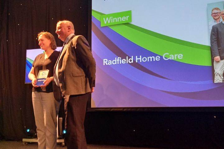 Hannah accepting award